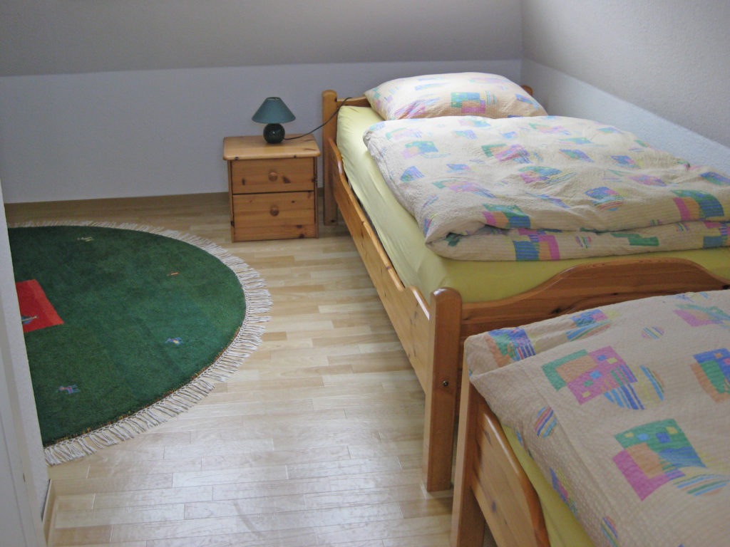 Schlafzimmer im Dachgeschoss - Ferienwohnung Nordstrasse Cuxhaven
